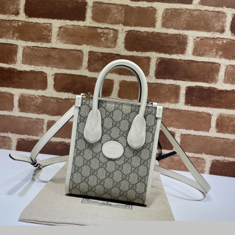 G*u*i top handle bags